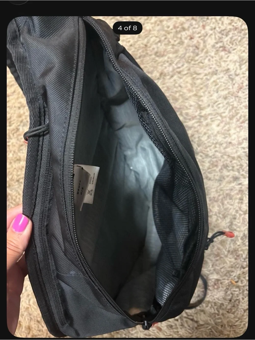 Sherpani Black Sling Bag with Red Accents